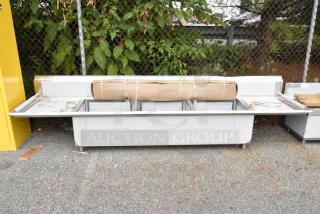 Brand new Regency 600S3242424S stainless steel sink, three compartments, 124", 14 gauge, with two 24" drainboards. Scratch and dent condition.
