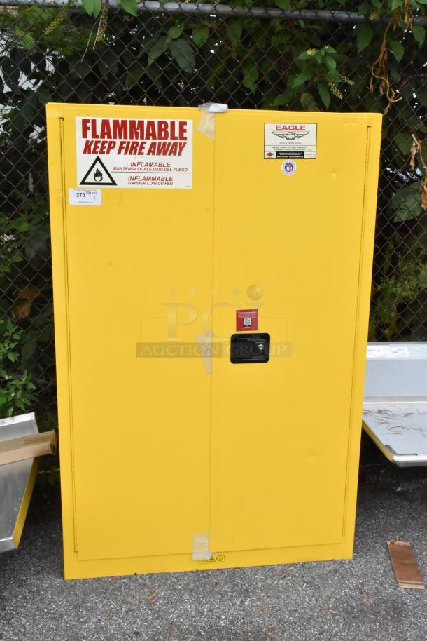 Yellow metal 2-door cabinet, brand new with minor dents. Features flammable warning label; ideal for safe storage. Eagle brand.