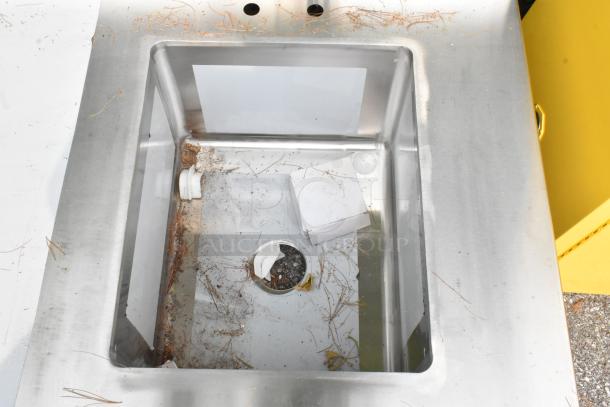 BRAND NEW Regency 600ST3072R stainless steel table with single bay sink; visible dirt and minor scratches.