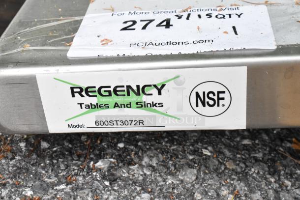 Brand new Regency 600ST3072R stainless steel table with sink. Slight scratches, NSF certified, model label visible.
