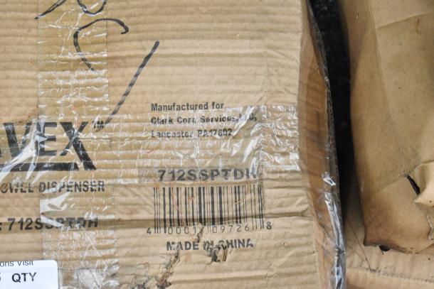 Cardboard box labeled Lavex 712SSPTDH, indicating a stainless steel paper towel dispenser. Box shows signs of wear.
