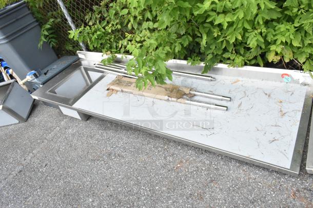 BRAND NEW SCRATCH AND DENT Regency 600ST3096L stainless steel table with single bay sink, minor imperfections visible.