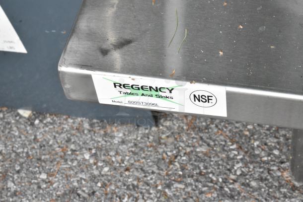 Regency 600ST3096L stainless steel table with single bay sink, brand new, minor scratches, NSF certified.