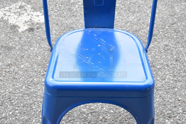 Blue metal Tolix style chair, brand new condition with minor scratches and dents. Sturdy construction, auction for three.