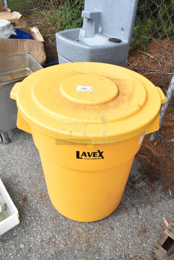 BRAND NEW Lavex 55 Gallon Yellow Trash Can with Lid. Minor scratches. Model: 475TCRND55YW.