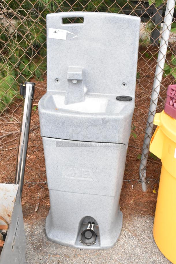 Brand new Lavex gray metal portable sink, scratch and dent model, with a sturdy design and visible brand logo.