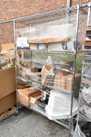 Chrome finish 4-tier wire shelving unit on commercial casters, includes new poly bins. Buyer must dismantle. Wrapped with contents.