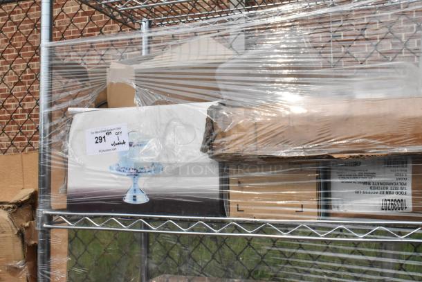 Chrome finish 4-tier wire shelving unit with commercial casters, includes new poly bins, plastic-wrapped for shipment.