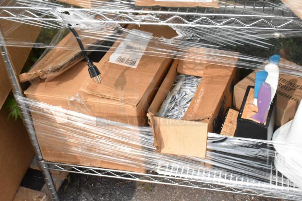 Chrome finish 4-tier wire shelving unit on commercial casters, wrapped, contains boxes and new poly bins. Buyer dismantle required.