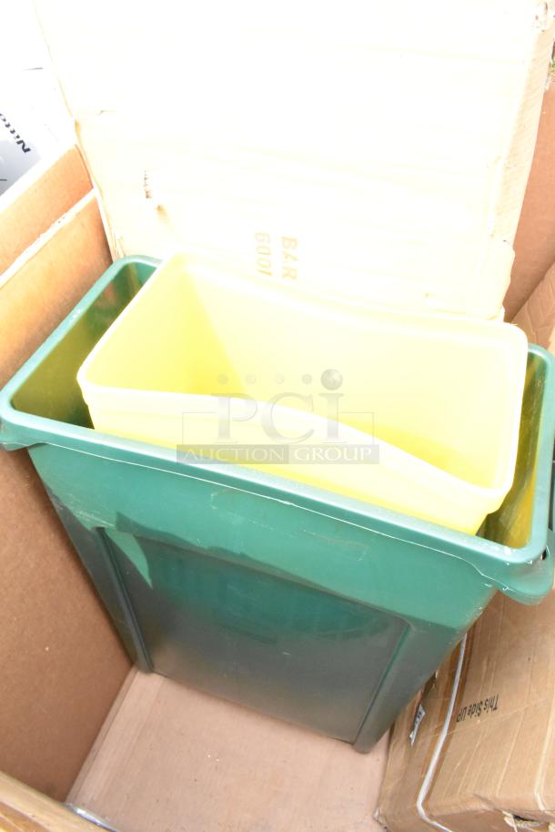 Yellow and green stackable bins in cardboard box, part of a lot of 8 scratch and dent items including stainless steel equipment.