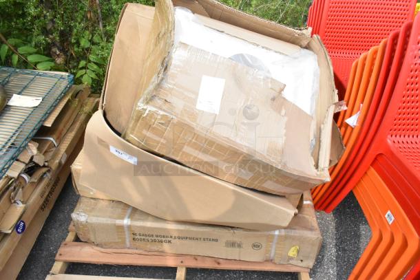 Four boxes, scratched and dented, contain a Regency 600ES3036GK stainless steel equipment stand and an American Louver plaque diffuser on a pallet.