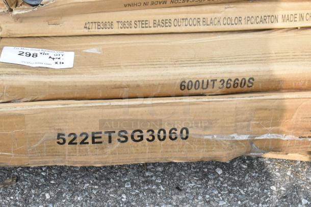 Cardboard boxes labeled 522ETSG3060, 600UT3660S, and 427TB3636. Items include new stainless steel work tables and bases.