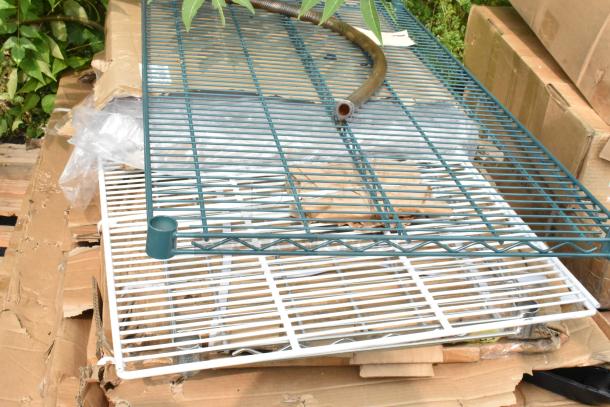 10 new scratch and dent items including Steelton 30"x60" stainless steel work table, Regency undershelf, Lancaster table base.
