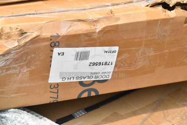 Cardboard box labeled "17816562 Door Glass LH G," showing scratch and dent condition.