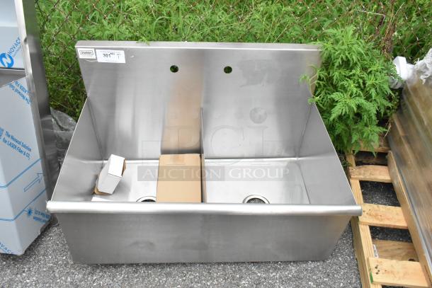 Steelton 18"x21"x14" two-compartment utility sink, stainless steel, new with minor scratches, label indicates for 8" faucet.