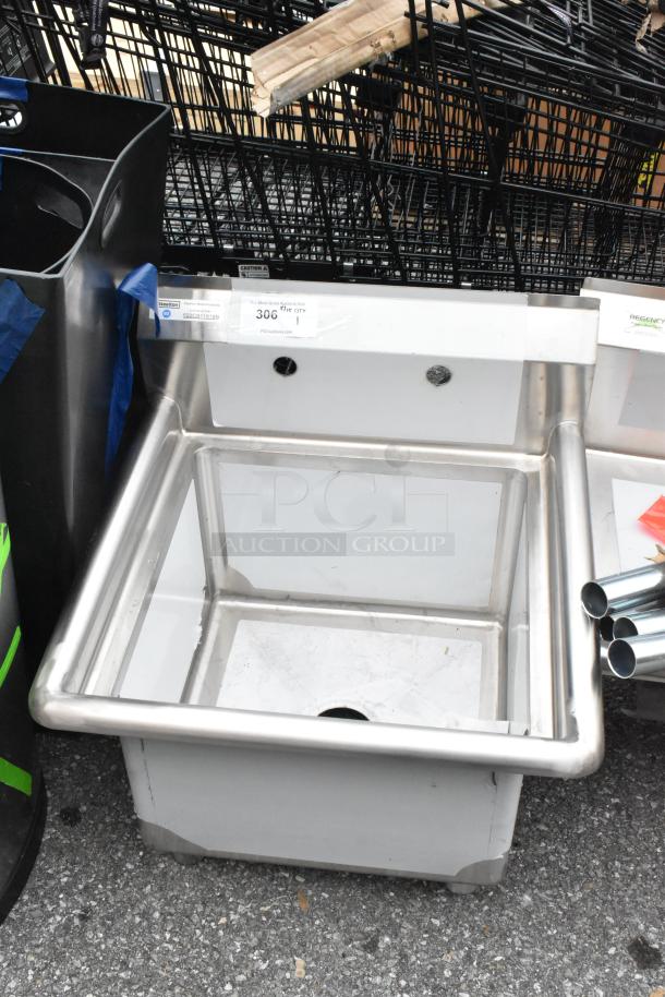 Brand new Steelton 522CS11818N stainless steel single bay sink, visible scratch and dent, model label shown.