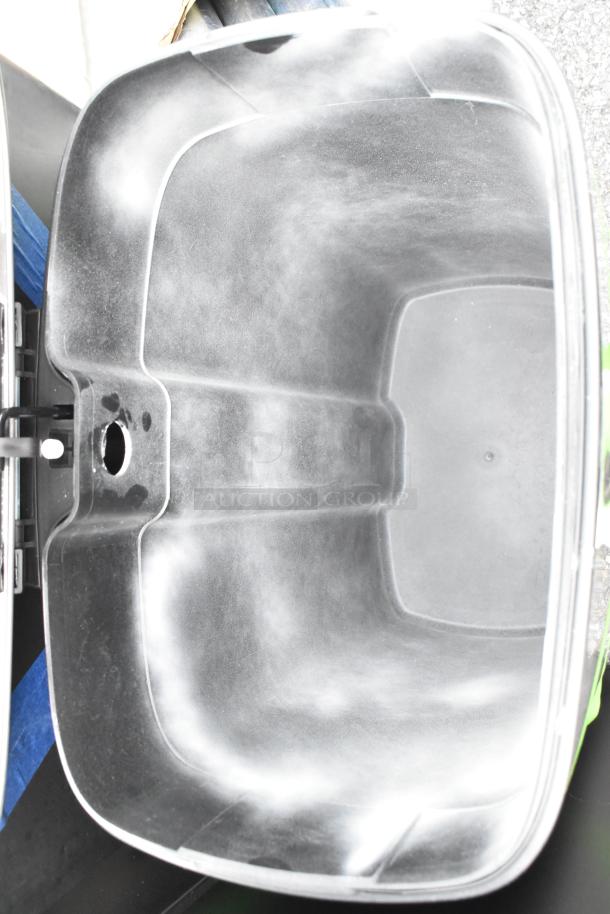 Brand new Lancaster Table & Seating chrome finish trash can. Interior view, minor scratches, durable construction.