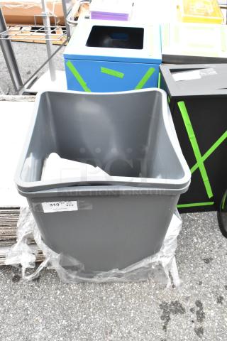 Gray poly trash can, brand new, labeled with auction tag. Scratch and dent condition. Buy one, get two offer.