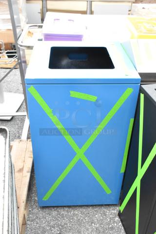 Blue metal trash can shell, brand new, with visible green tape markings indicating scratches and dents.