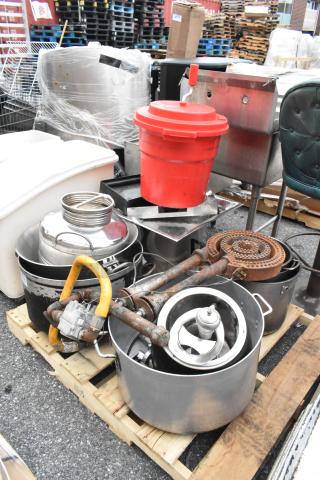 Pallet lot with red salad spinner, metal pots, burners, and gas hoses. Various kitchen items, mixed condition, for auction.