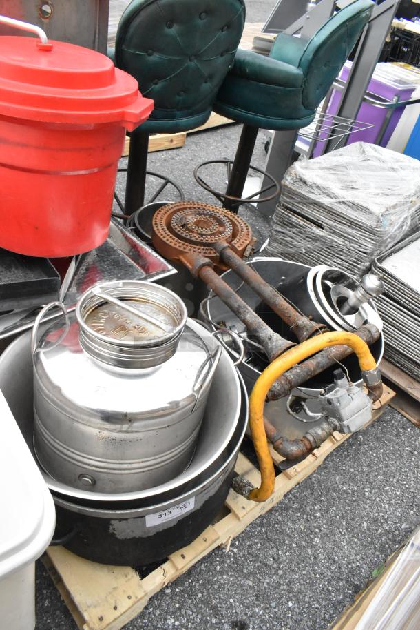 Pallet lot with red salad spinner, metal pots, burners, gas hoses, and assorted items. Ideal for bulk purchase.