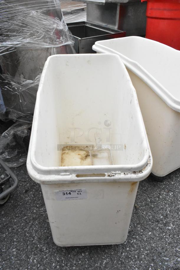 White poly ingredient bin on commercial casters, used, visible marks, capacity label "314 QT X2", ideal for storage.