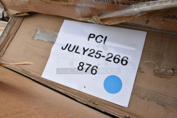 Label on a cardboard box showing "PCI JULY25-266 876" with a blue dot, indicating auction information.