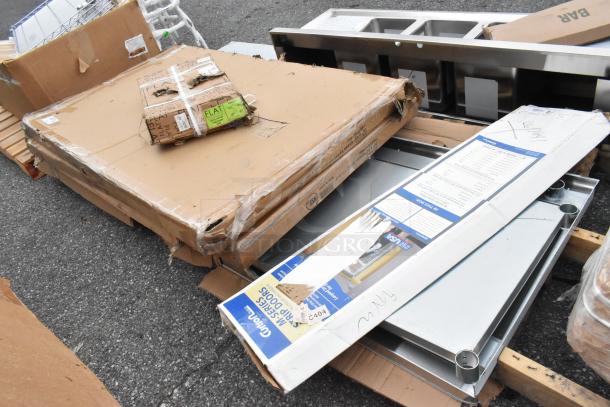 New scratch and dent items including Table Top Thermo Form 3048 GRY Wood, Steelton 30"x96" 18 Gauge 430 Stainless Steel Work Table.
