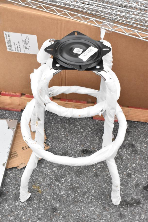 2 black metal stool frames, model 164GS605BFR, wrapped in white protective material, new with minor scratches.