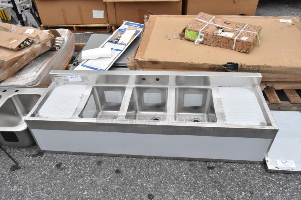 Regency stainless steel 3-bay back bar sink, model 600B31014213, with dual drain boards. Scratch and dent condition.