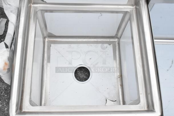 Brand new Steelton 522CS11818N sink, 18-gauge stainless steel, 18"x18"x12" bowl, no legs, some visible scratches.