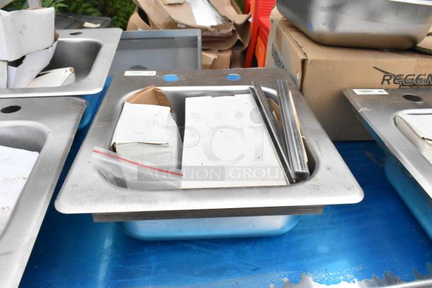 2 Regency 600DI1995 9" x 9" x 5" 18-gauge stainless steel drop-in sinks, new scratch and dent condition, with packaging.
