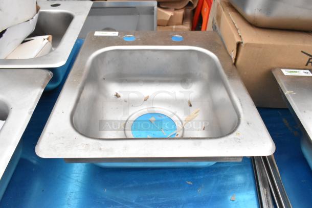 9" x 9" x 5" 18-gauge stainless steel Regency drop-in sink, new scratch and dent, one compartment, model 600DI1995.