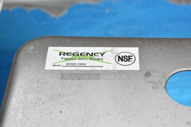 Brand new Regency 600DI1995 18-gauge stainless steel drop-in sink, 9"x9"x5", one compartment. Label shows NSF mark.