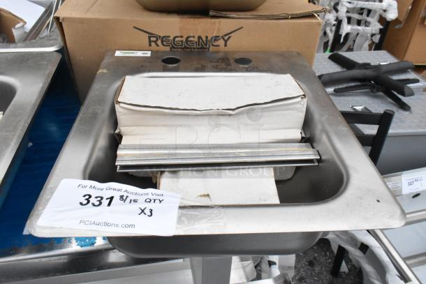 Brand new Regency 600DI1995 9"x9"x5" stainless steel sink, 18-gauge, one compartment, with visible scratch and dent.