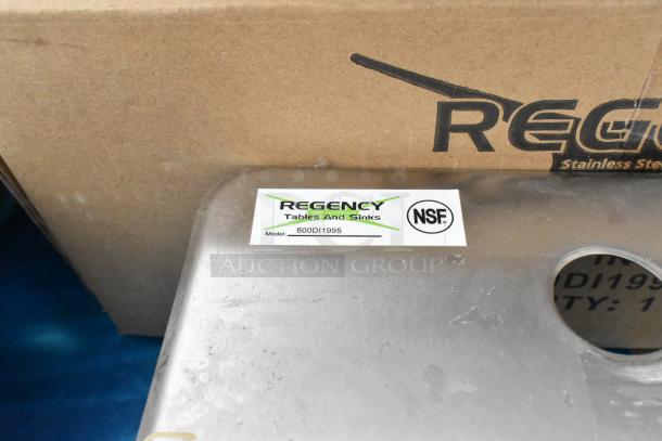 Regency 600DI1995 9"x9"x5" stainless steel sink, scratch and dent, new. NSF label visible on corner.