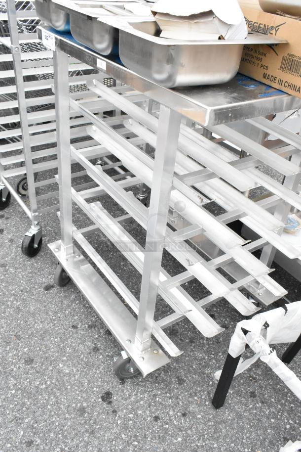 Metal commercial #10 can rack on casters, featuring sturdy metal construction and multiple storage slots.