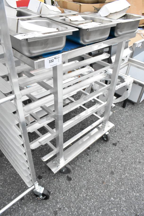 Metal commercial #10 can rack with multiple shelves, on sturdy casters for mobility. Ideal for kitchen or storage use.
