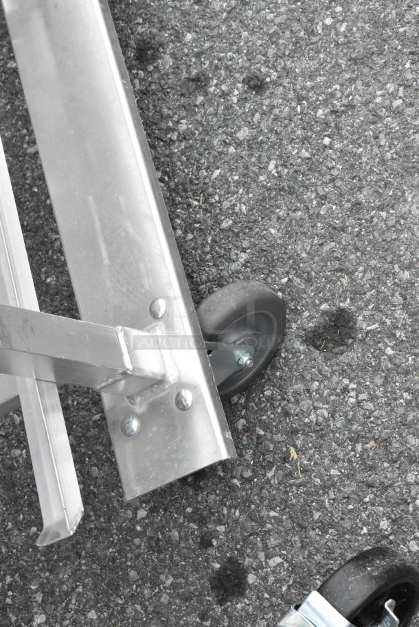 Metal commercial #10 can rack on wheels, featuring sturdy metal construction and commercial casters for easy mobility.