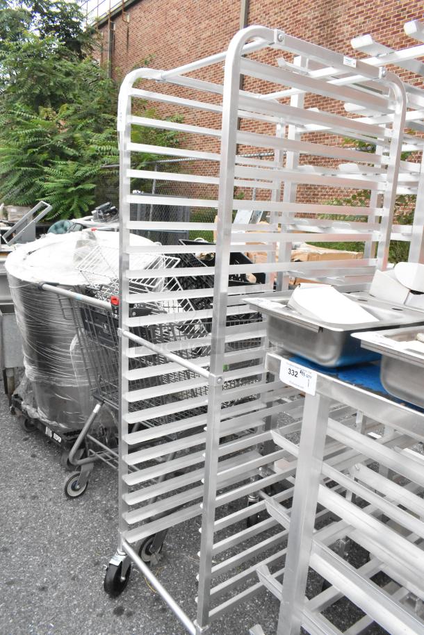 Regency 109RACKECON metal commercial pan transport rack on casters, 20-tier, silver, outdoor setting, excellent condition.