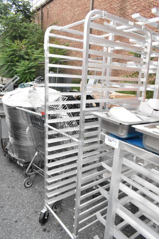 Regency 109RACKECON metal commercial pan transport rack on casters, 20-tier, silver, outdoor setting, excellent condition.