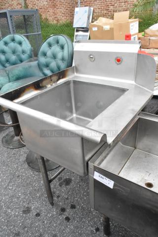 Stainless steel left side dirty side dishwasher table with integrated sink, sturdy legs, visible rust spots, and numbered tag.