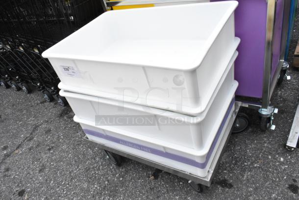 Two white poly dough bins on a dolly, labeled "Allergen Free," stacked on pavement.