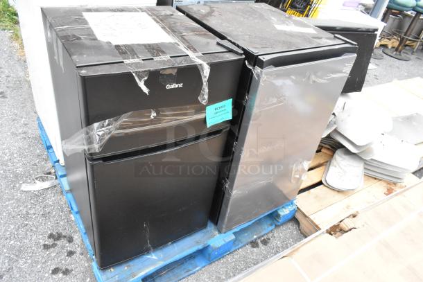 Four mini coolers including Snyo SR-4310W and Galanz models, wrapped in plastic, on a pallet. Various brands visible.