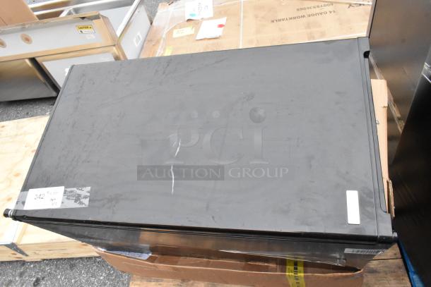 Lot of 12 items including metal fan blades, various conditions shown. Items on pallets with visible labels, unclear text.
