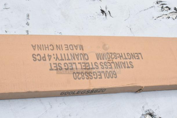 Cardboard box labeled "Stainless Steel Leg Set 600LEGSS820," indicating contents. Box shows slight wear, marked "Made in China."
