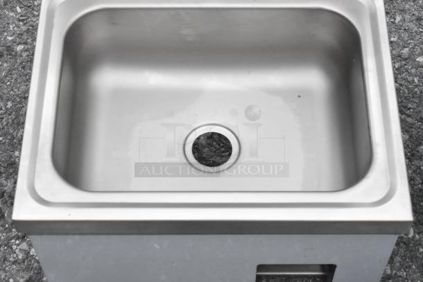 Brand new Regency 600HS17KSPT 17"x15" hands-free hand sink, wall-mounted, knee-operated valve, slight scratches.