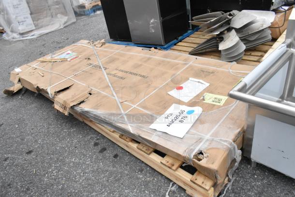 BRAND NEW SCRATCH AND DENT! Regency Spec Line 36" x 96" stainless steel work table with undershelf, boxed, minor damage.
