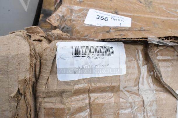Cardboard packaging with visible wear, displaying a label for a Tor Rey EQM-400/800 scale, indicating a new item with scratches and dents.
