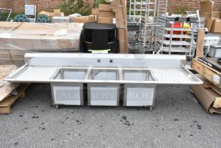 Brand new Regency 600S31824224 stainless steel 3 bay sink with dual drain boards, no legs, scratch and dent condition.